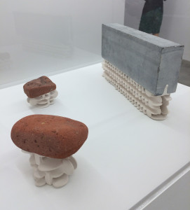 Installation view of Alan Wiener’s Untitled (8), Untitled (6) and Untitled (5) from 2014 and 2015 in aquaresin, brick and stone at 11R, June, 2016.