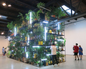 Rashid Johnson, Antoine’s Organ, black steel, grow lights, plants, wood, shea butter, books, monitors, rugs, piano, unique installation, 480.1 x 858.5 x 321.9 cm, 2016.