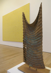Michele Grabner, Untitled, bronze, 43 ½ x 20 x 12 ½ inches, unique, 2016.  Background painting:  Untitled, oil on burlap and canvas, 86 ½ x 120 inches, 2016.