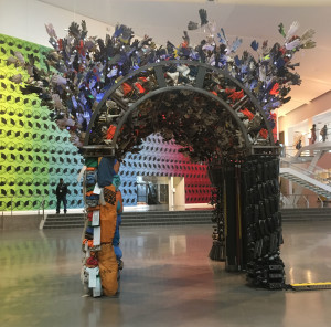 Mierle Laderman Ukeles, Ceremonial Arch IV, 5,000 + gloves donated from 10 urban organizations, in steel cages and on steel rods, situated over six columns wrought from materials donated from local and federal agencies, 1988/1993/1994/2016.